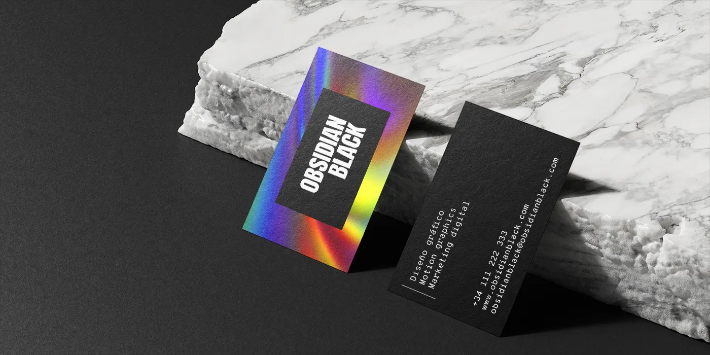 tarjetas de visita sobre bloque de mármol